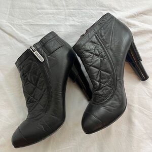 CHANEL Black Quilted Heeled Boots